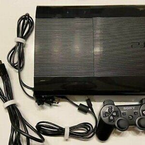 PS3 console super slim ,with 5 controllers and 16 games.